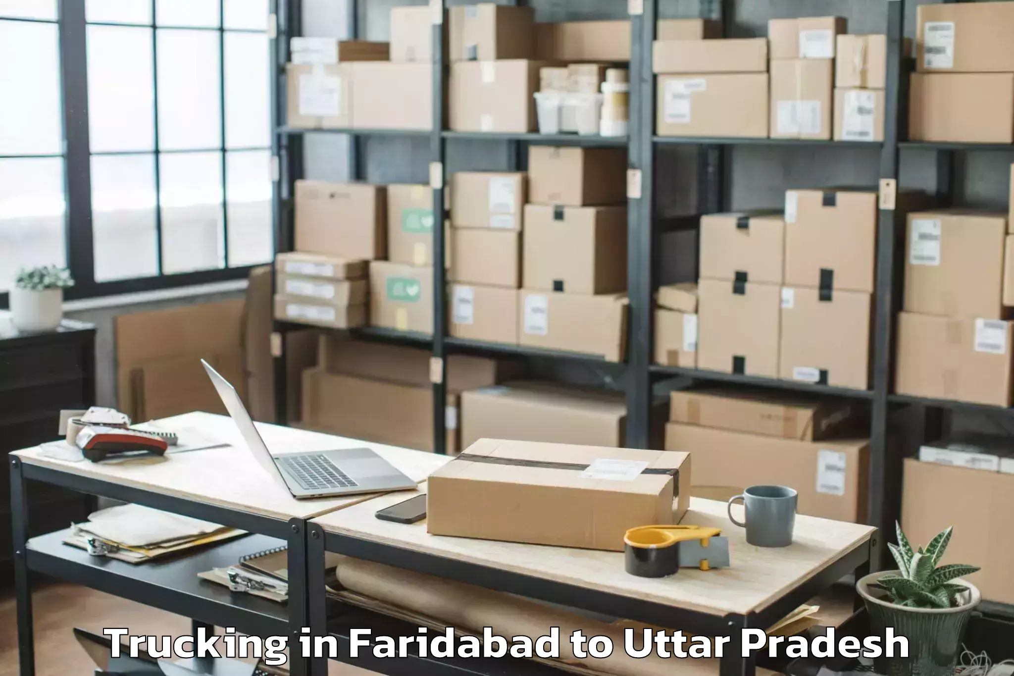 Leading Faridabad to Manjhanpur Trucking Provider